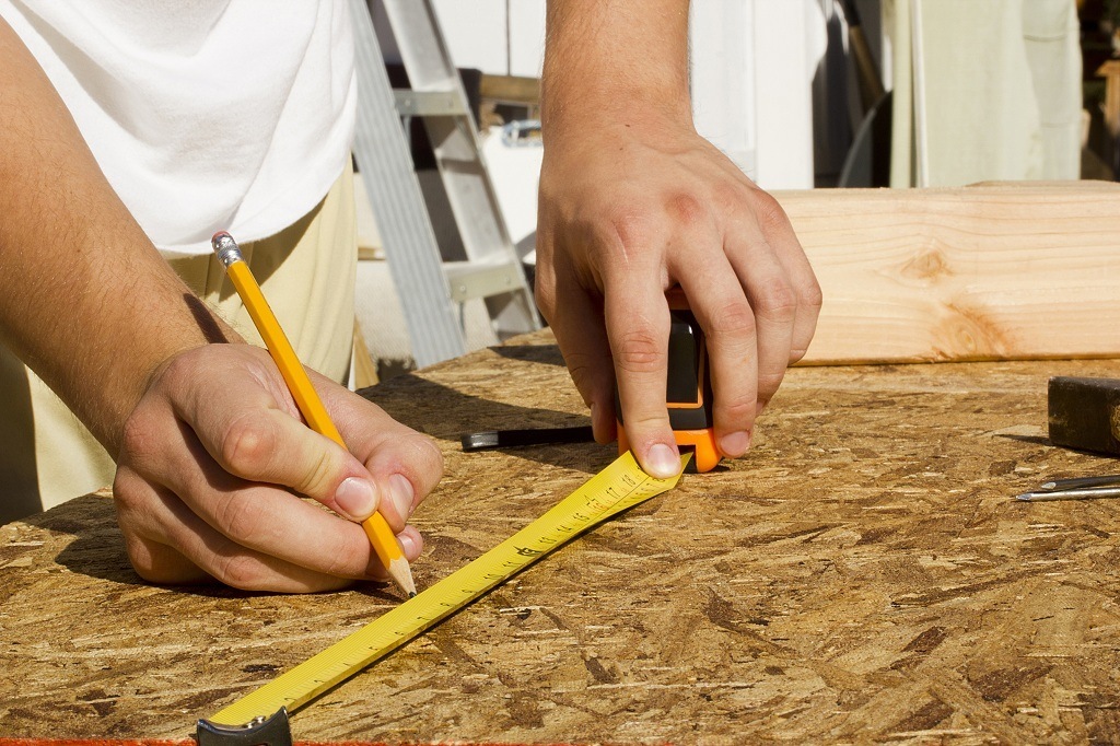 measuring, OSB, wood, panel, hand, tape measure, distance, length, accuracy, building, carpenter, carpentry, caucasian, closeup, construction, contractor, device, equipment, hand, home, improvement, industrial, industry, instrument, male, pencil, repairing, ruler, tape, tool, white, wood, worker, working