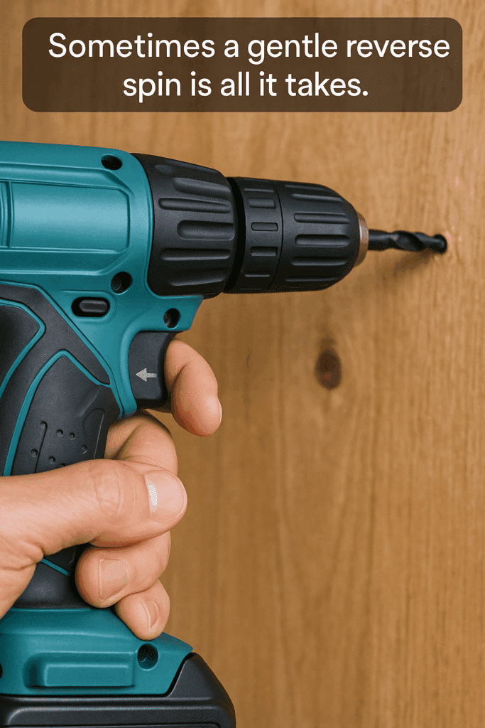 Attempting to remove the stuck drill bit by reversing direction