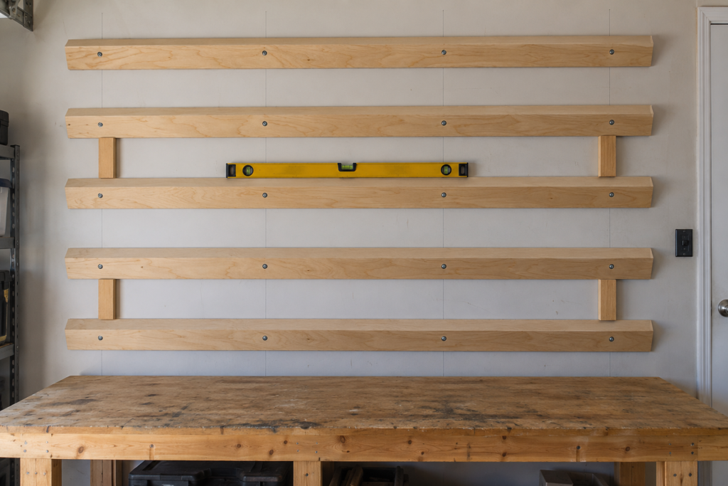 French cleat wall layout with five level plywood rows